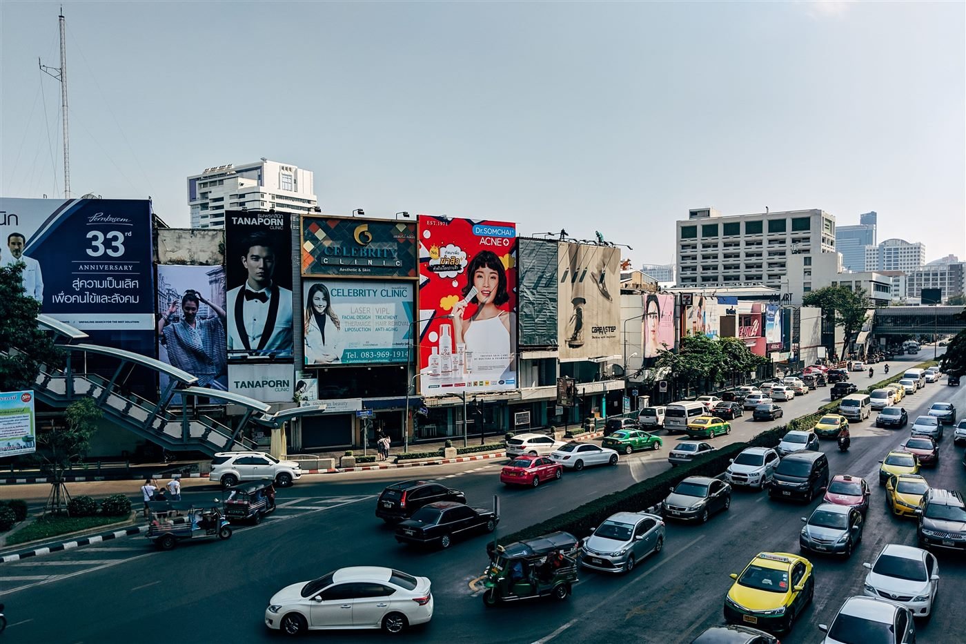 Street lined with advertising billboards
